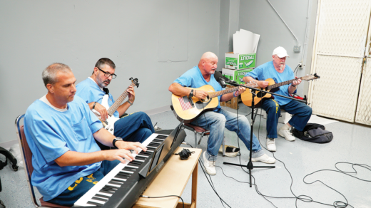 Quentin Blue performing at San Quentin.