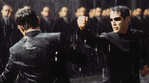 Neo from "The Matrix" in the middle of a fight.