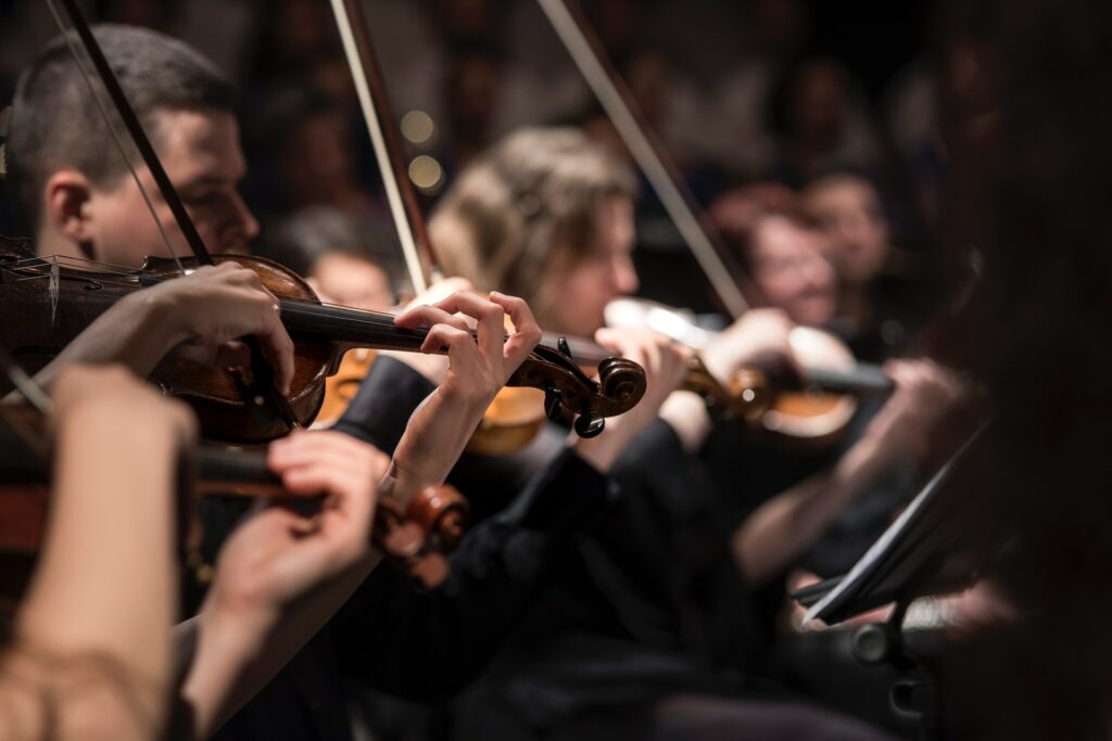 An orchestra playing music.