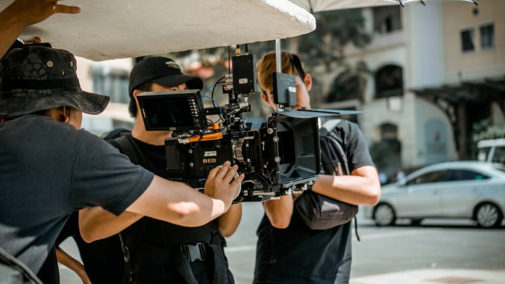 A camera crew getting ready to film some choreography.