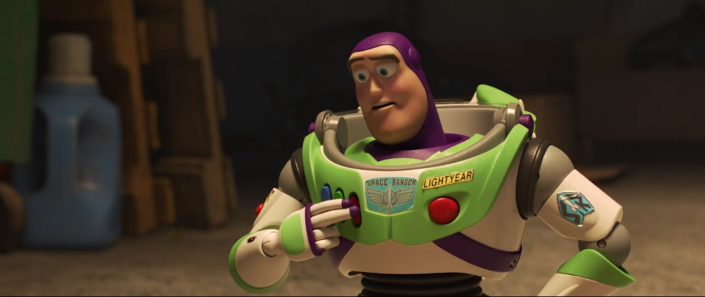 Buzz Lightyear in "Toy Story 4" pressing his button to listen to his inner voice.