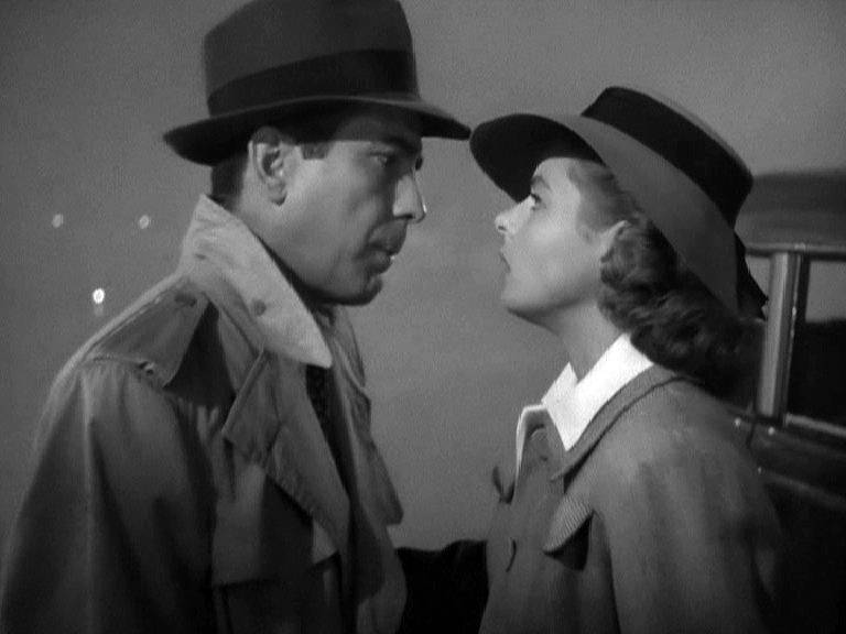 The two main characters from the timeless movie "Casablanca" staring at each other lovingly.