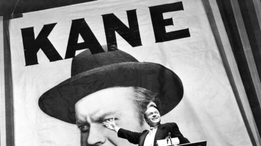 The famous shot of the giant "Kane" poster being pointed at.