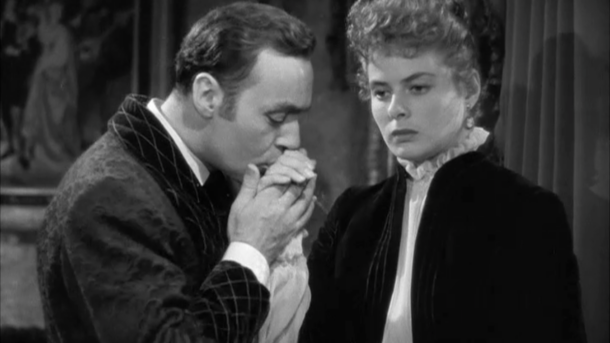 Gregory kissing Paula's hand in the movie "Gaslight"